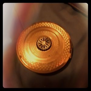 Vintage goldtone makeup compact with powder puff